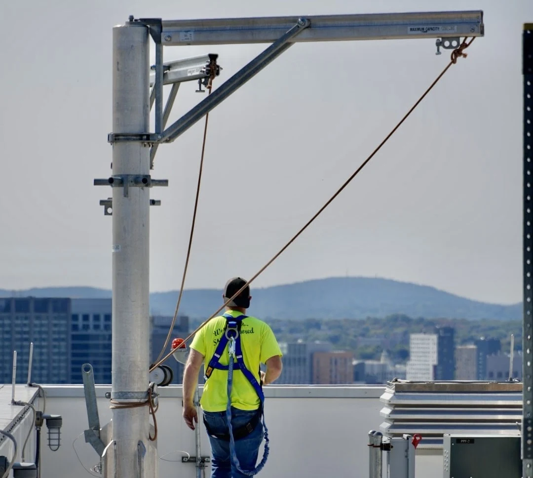 Rooftop davit arms and suspension equipment
